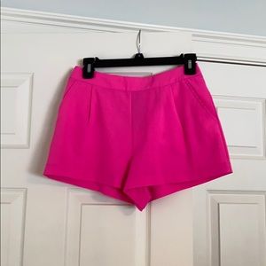 Hot pink elastic zip shorts with pockets